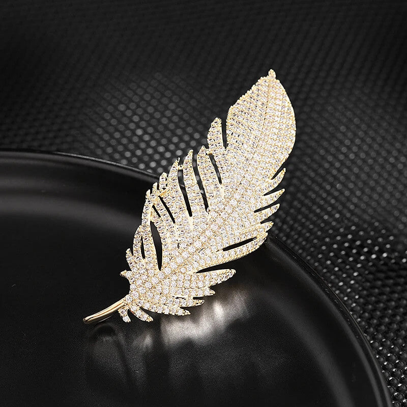 Copper Feather Brooch With Inlaid Micro Cubic Zirconia in Gold - Mounteen