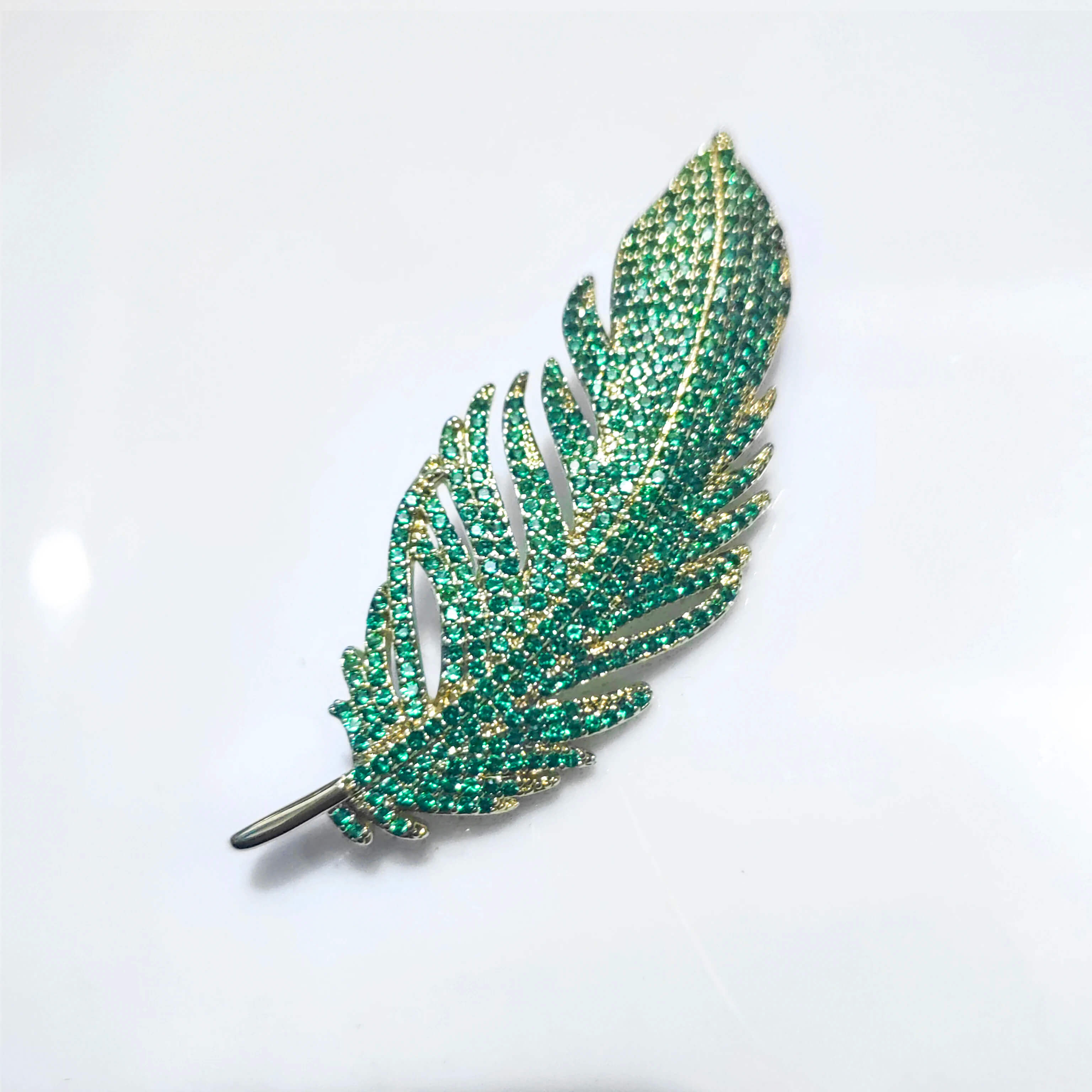 Copper Feather Brooch With Inlaid Micro Cubic Zirconia in Green & Gold - Mounteen