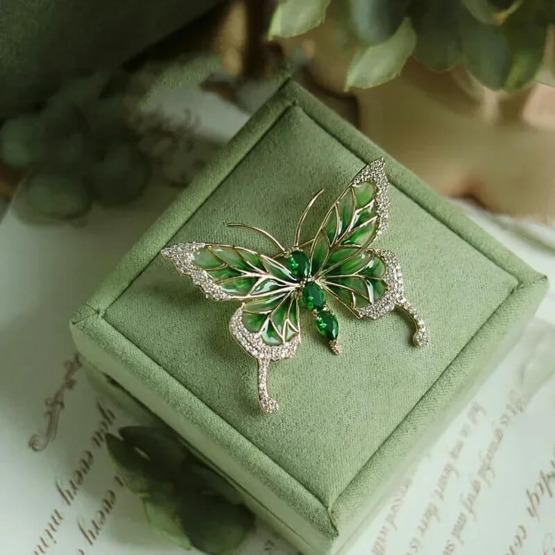 Emerald Butterfly Brooch Encrusted With Rhinestones and Imitation Gemstones - Mounteen