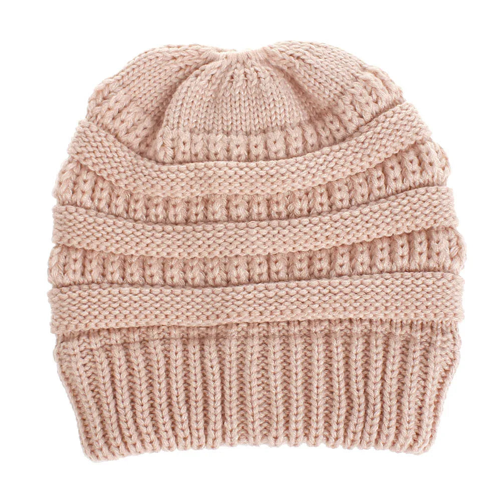 Pink Soft Knit Ponytail Beanie. Shop Winter Hats on Mounteen. Worldwide shipping available.