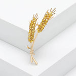 Two Gold-Toned Straws Brooch With Simulated Gemstones in Yellow - Mounteen