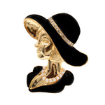 Woman In Hat Gold-Toned Brooch With Rhinestone-Encrusted Hatband and Necklace of Simulated Gemstones - Mounteen
