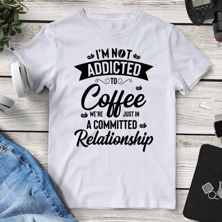 I’m Not Addicted To Coffee We’re Just In A Committed Relationship Tee. Shop Shirts & Tops on Mounteen. Worldwide shipping available.