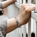 Adjustable Symbolic Silver Feather Bracelet. Shop Bracelets on Mounteen. Worldwide shipping available.