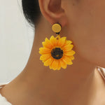 Bright & Refreshing Yellow Sunflower Earrings. Shop Earrings on Mounteen. Worldwide shipping available.