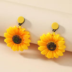 Bright & Refreshing Yellow Sunflower Earrings. Shop Earrings on Mounteen. Worldwide shipping available.