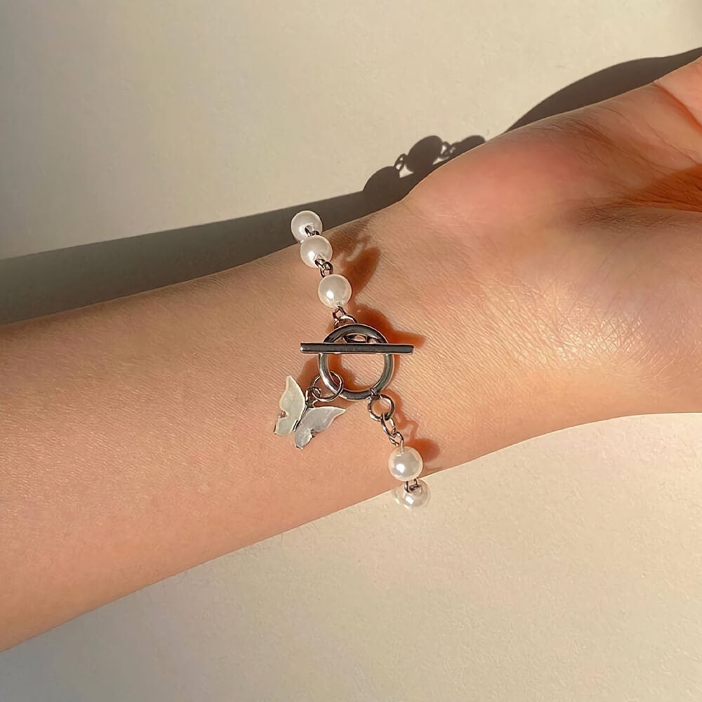 Butterfly Charm Bracelet With Pearl Chain. Shop Bracelets on Mounteen. Worldwide shipping available.