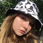 Cow Print Bucket Hat. Shop Hats on Mounteen. Worldwide shipping available.