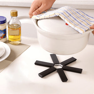 Folding Heat Insulation Pad. Shop Cookware Accessories on Mounteen. Worldwide shipping available.
