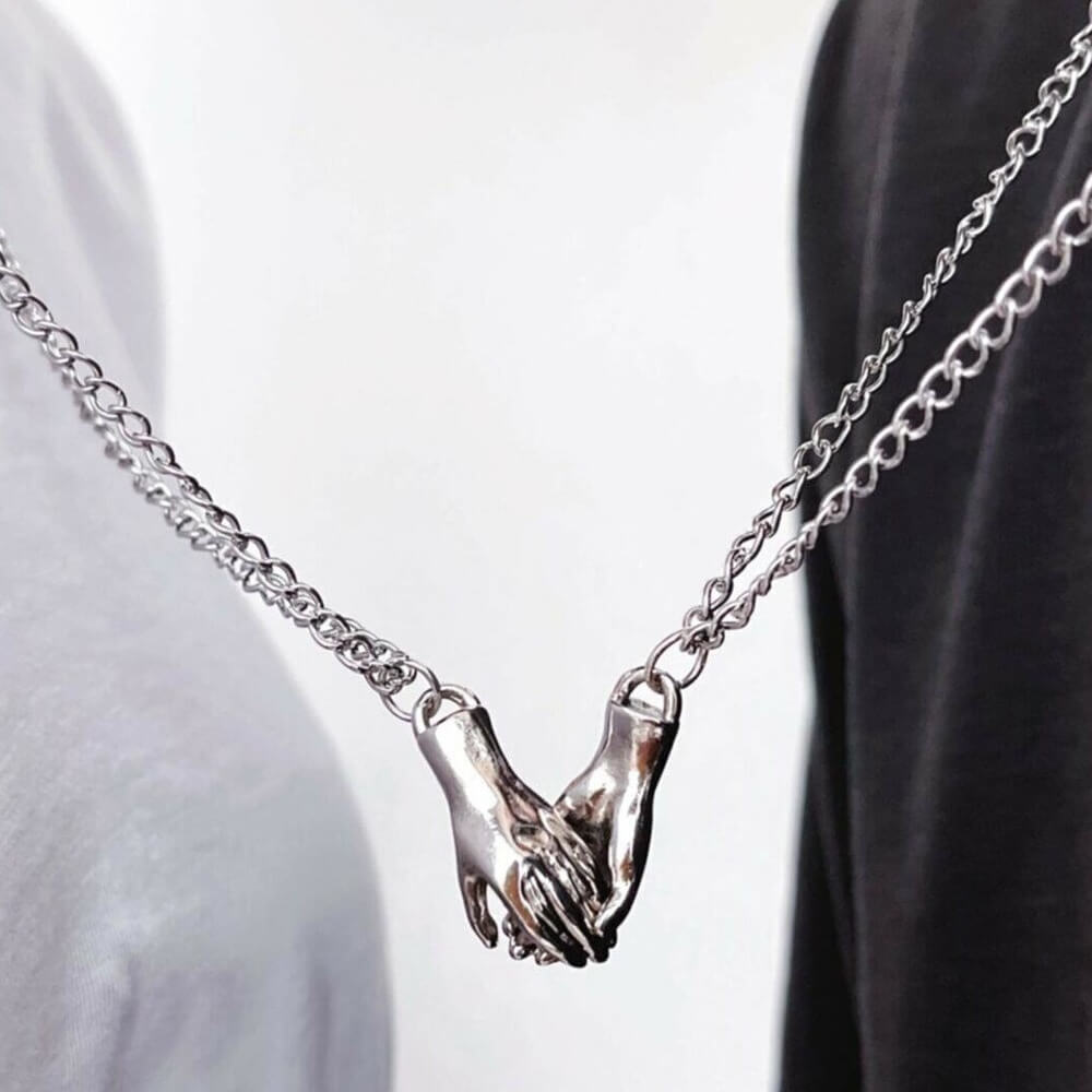 Hold Hands Couple Necklace. Shop Jewelry on Mounteen. Worldwide shipping available.