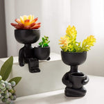 Human Shaped Ceramic Sitting Flower Pots. Shop Pots & Planters on Mounteen. Worldwide shipping available.