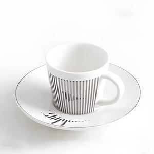 Mirror Anamorphic Cup & Saucer. Shop Coffee & Tea Cups on Mounteen. Worldwide shipping available.