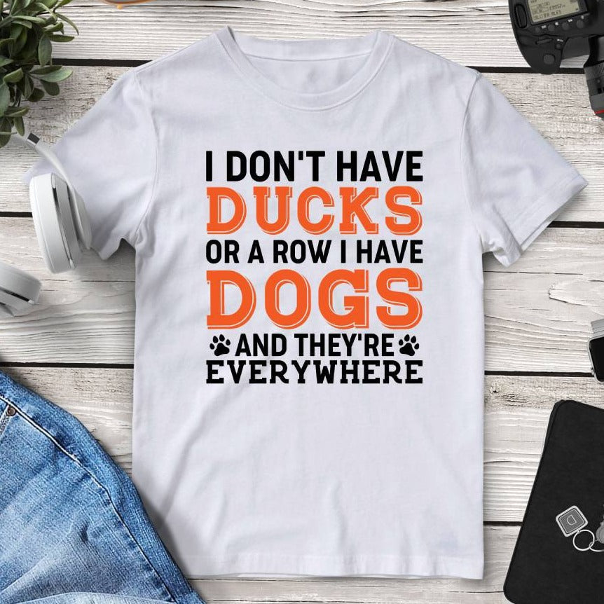I Don’t Have Ducks Or A Row I Have Dogs And They’re Everywhere Tee. Shop Shirts & Tops on Mounteen. Worldwide shipping available.