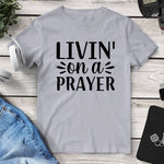 Livin' On A Prayer Tee. Shop Shirts & Tops on Mounteen. Worldwide shipping available.