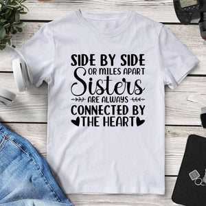 Sisters Connected By The Heart Tee. Shop Shirts & Tops on Mounteen. Worldwide shipping available.