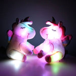Multicolored Light Up Unicorn Plush Toy. Shop Stuffed Animals on Mounteen. Worldwide shipping available.