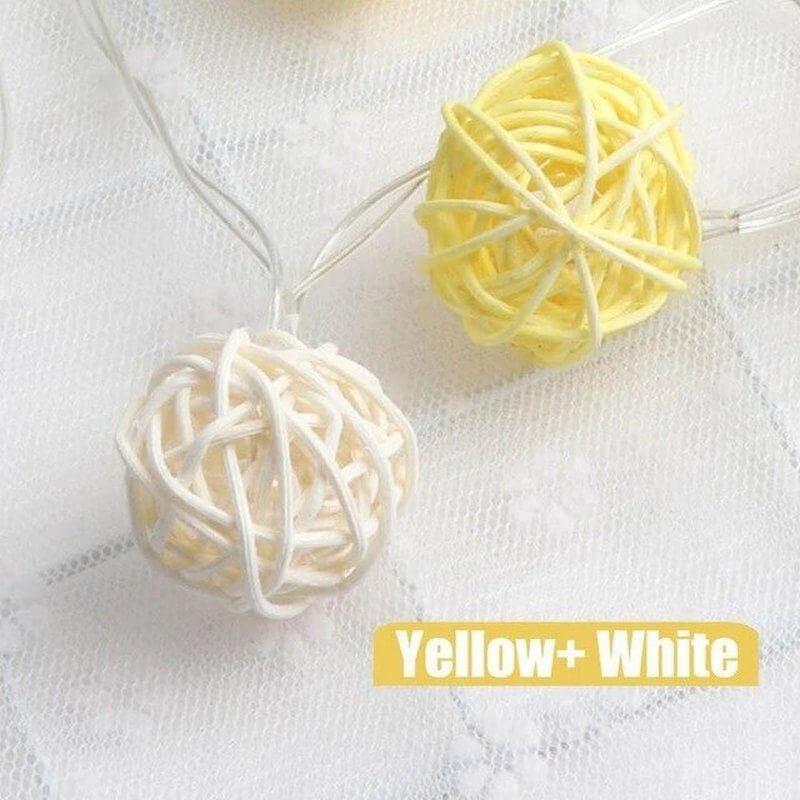 yellow and white rattan ball string lights