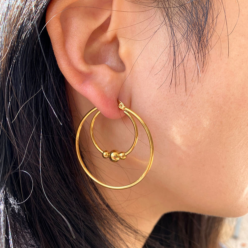 Single Piercing Double Hoop Earrings. Shop Earrings on Mounteen. Worldwide shipping available.