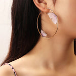 Small and Large Butterfly Hoops Earrings. Shop Earrings on Mounteen. Worldwide shipping available.