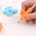 Two Fingers Ergonomic Pencil Grip. Shop Writing & Drawing Instrument Accessories on Mounteen. Worldwide shipping available.