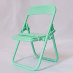 Versatile Mini Folding Chair Phone Stand. Shop Mobile Phone Accessories on Mounteen. Worldwide shipping available.