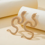 Zinc Alloy Snake Earrings. Shop Earrings on Mounteen. Worldwide shipping available.