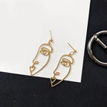 Zinc Alloy Wire Face Earrings. Shop Earrings on Mounteen. Worldwide shipping available.
